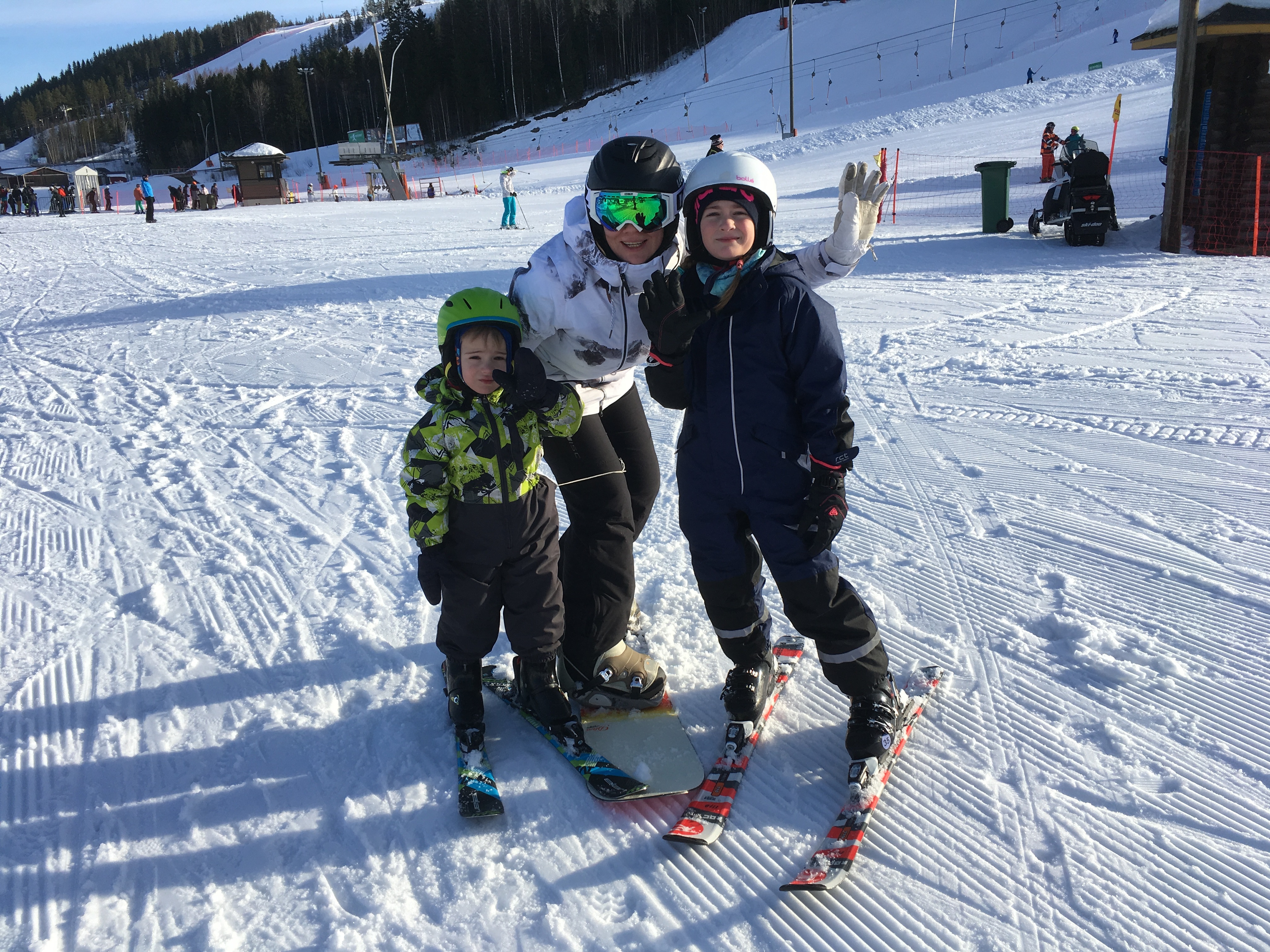 Triin Hertmann at a ski resort with her children